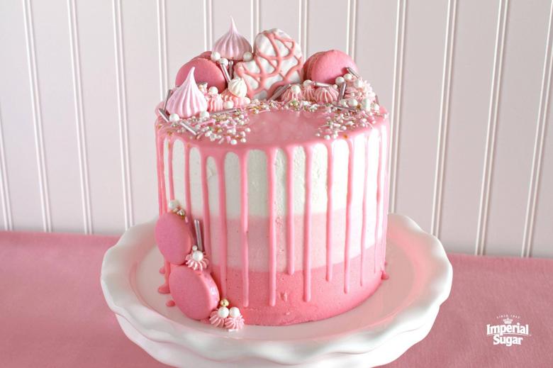 An elegant detailed cake made with handcrafted peonies and pearls. A pink  and gold theme cake – Creme Castle